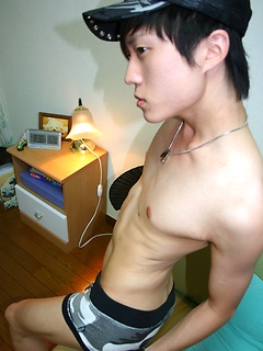 Cute Korean boy playing with his sex toy while jerking off