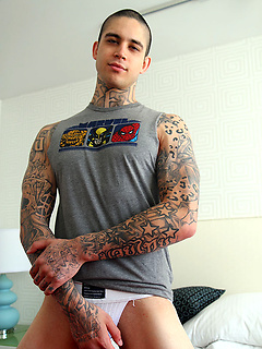 Tattooed boy Anthony Blaize shows his dick