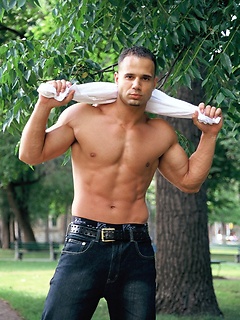 Victor Lucca poses outdoors and in a bed