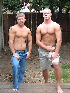 Workout buddies Nick and Tommy D pose together naked on the couch