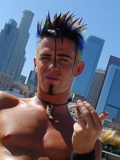 Thin Punk With Mohawk Works His Cock & Balls