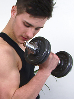 Horny young jock lets us watch the bulge grow in his skimpy underwear