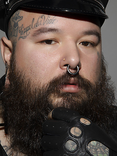 Tattooed Chub has a bearded baby face and a daddy's attitude...